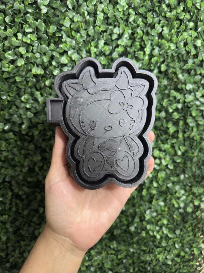 Cow print kitty