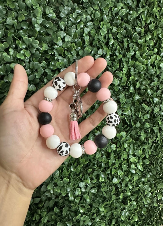 Cow print wristlet